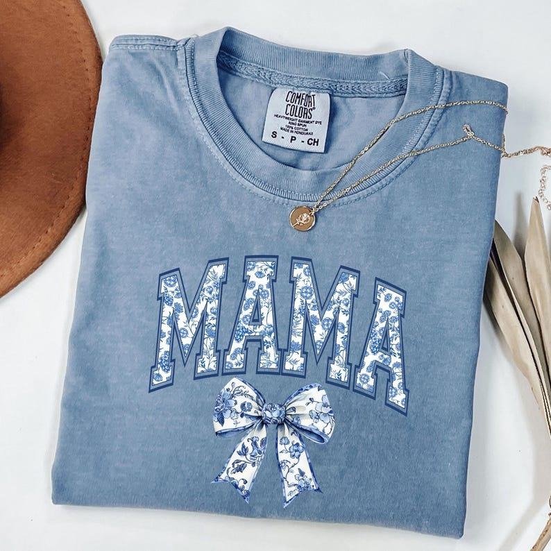 Comfort Colors Coquette Bow Mama T-Shirt, Coquette Blue Bow Shirt, Mother's Day Gift Hoodie, Sweatshirt | RetroVerseTees.com