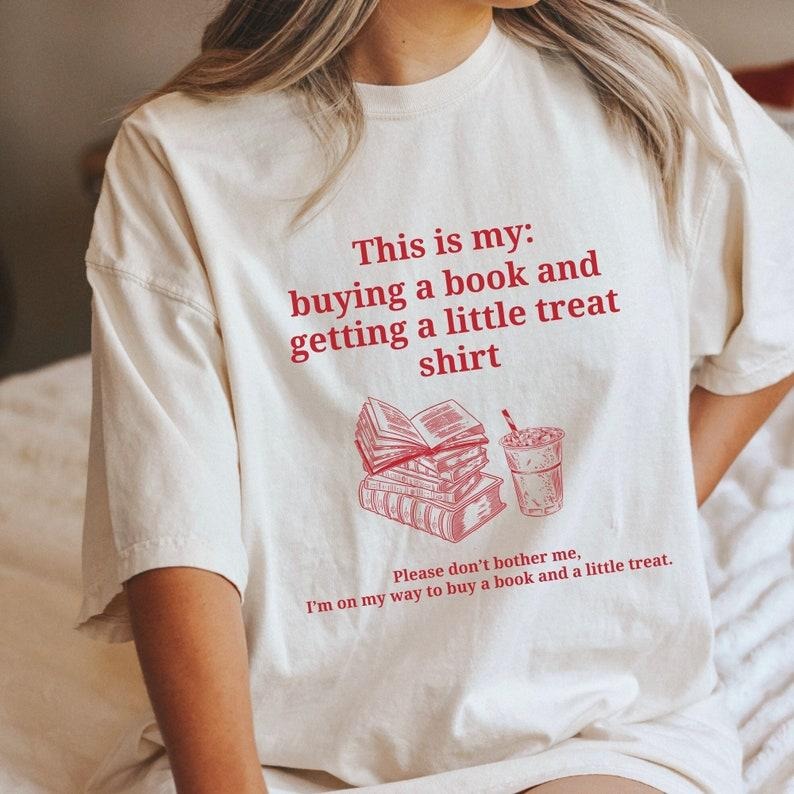 Cute Hoodies For Girls Buying a book and getting a little treat shirt. Bookish shirt. Retro book shirt. Book lover shirt....