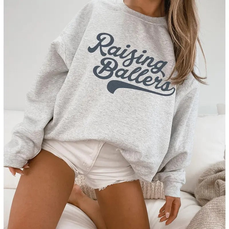 Raising Ballers Sports Mom Sweatshirt Vintage Aesthetic Trendy Crewneck Mothers Day gift Tailgating Shirt Sports Mom...